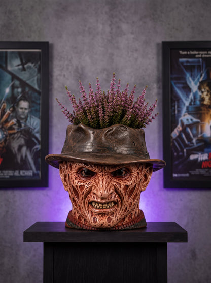Freddy Krueger planter, gray wall, themed posters